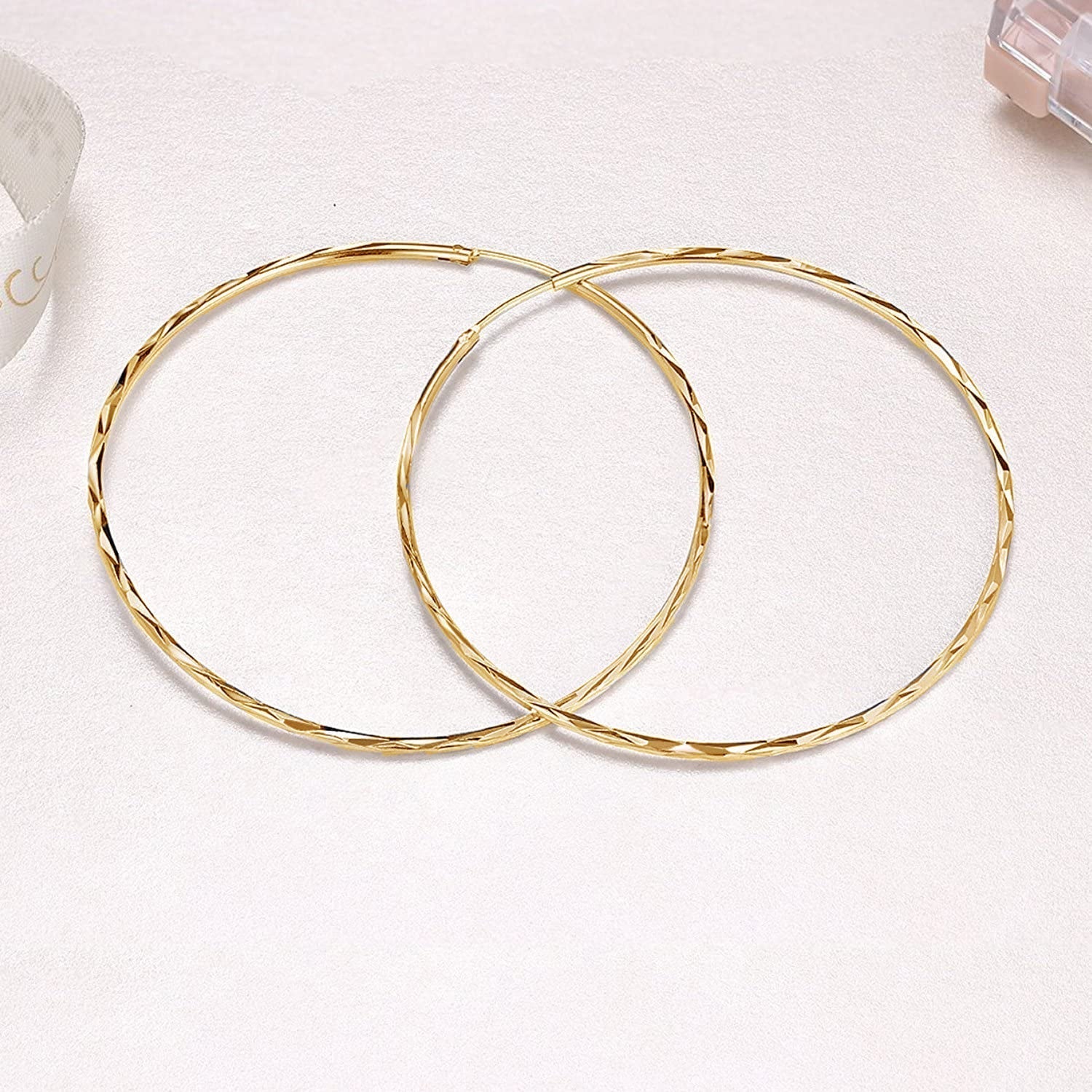 Sterling silver circle endless hoop earrings for women, stylish jewelry gift with a sleek, minimalist design.