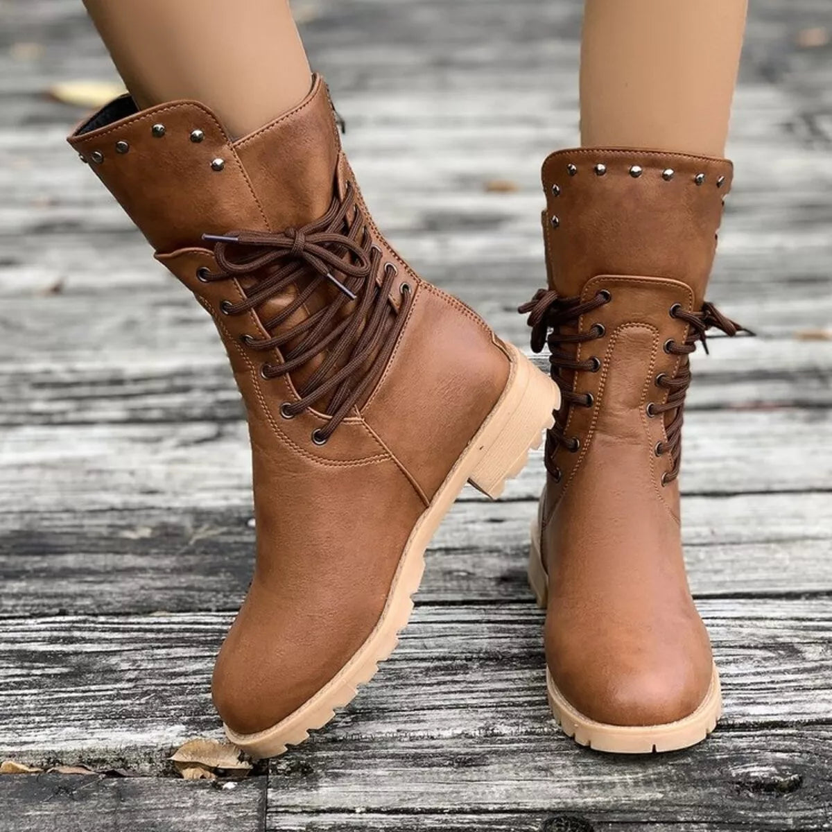 Lace-up black block heel boots from Trendsi, stylish footwear with chunky heels and lace-up front for a trendy look.