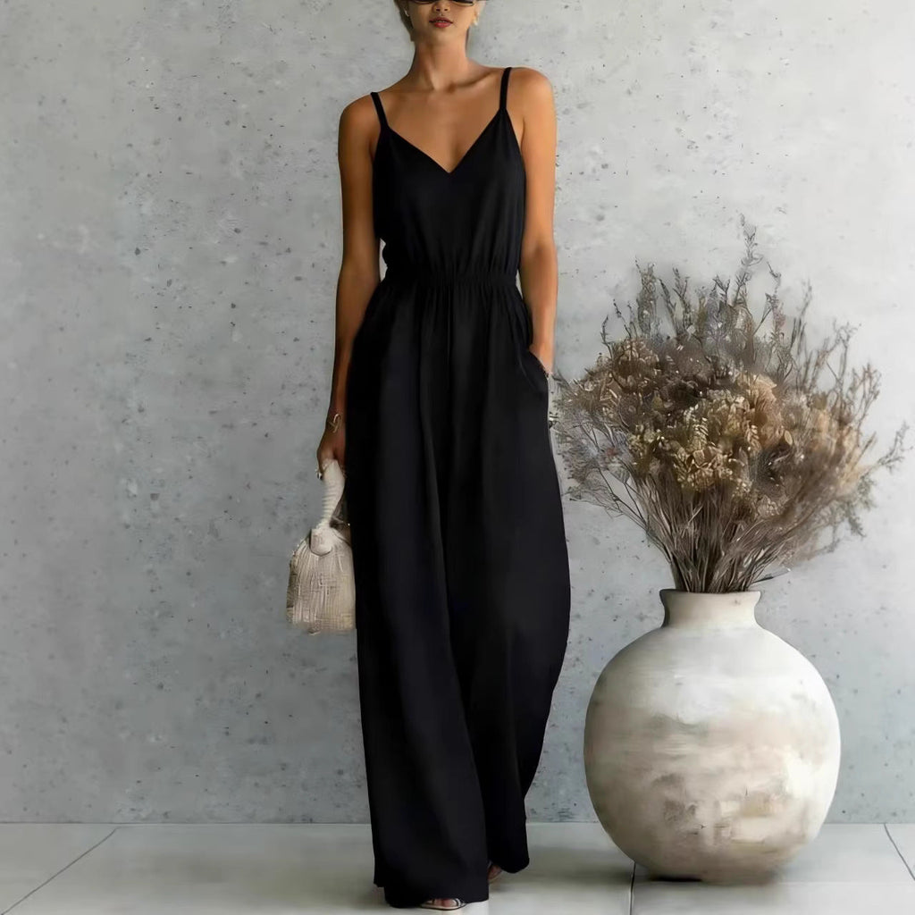 Women's sleeveless wide-leg jumpsuit by FitiqueFit in 5 colors, displayed with front view and flowing fabric.