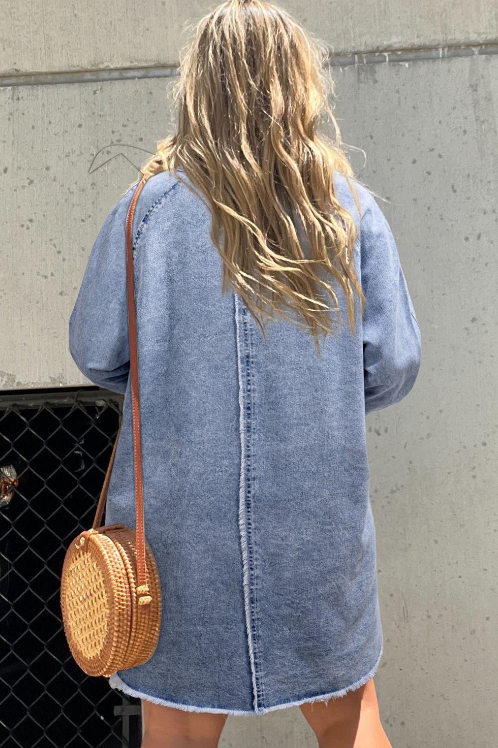 Raw hem button-down long sleeve denim dress by Plush Fashion Hub, featuring classic denim fabric and casual style.