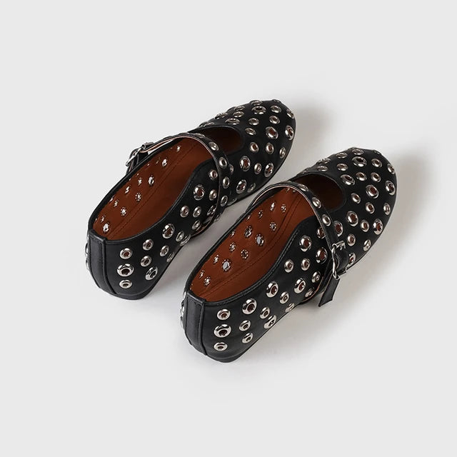 Plush Fashion Hub riveted round toe Mary Jane flats with strap and buckle detail on black leather-like material.