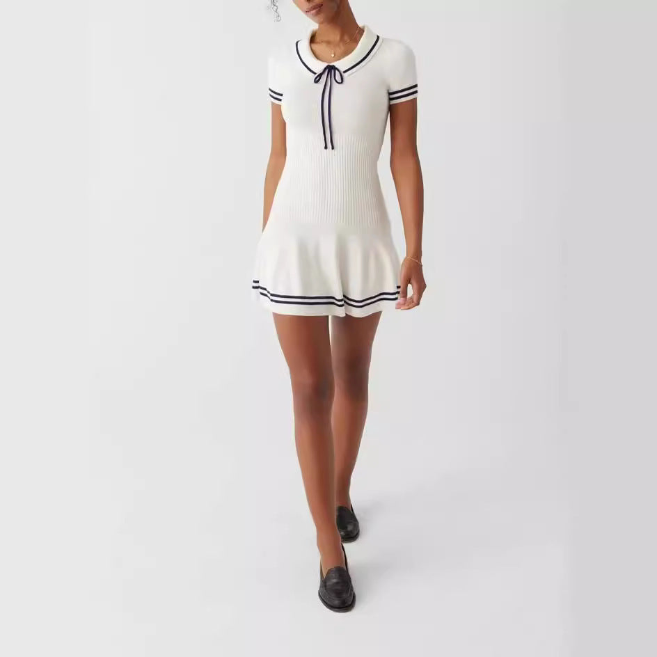 Women’s striped knit midi dress from FitiqueFit, casualwear with a fitted bodice and flowing skirt, shown on a model.