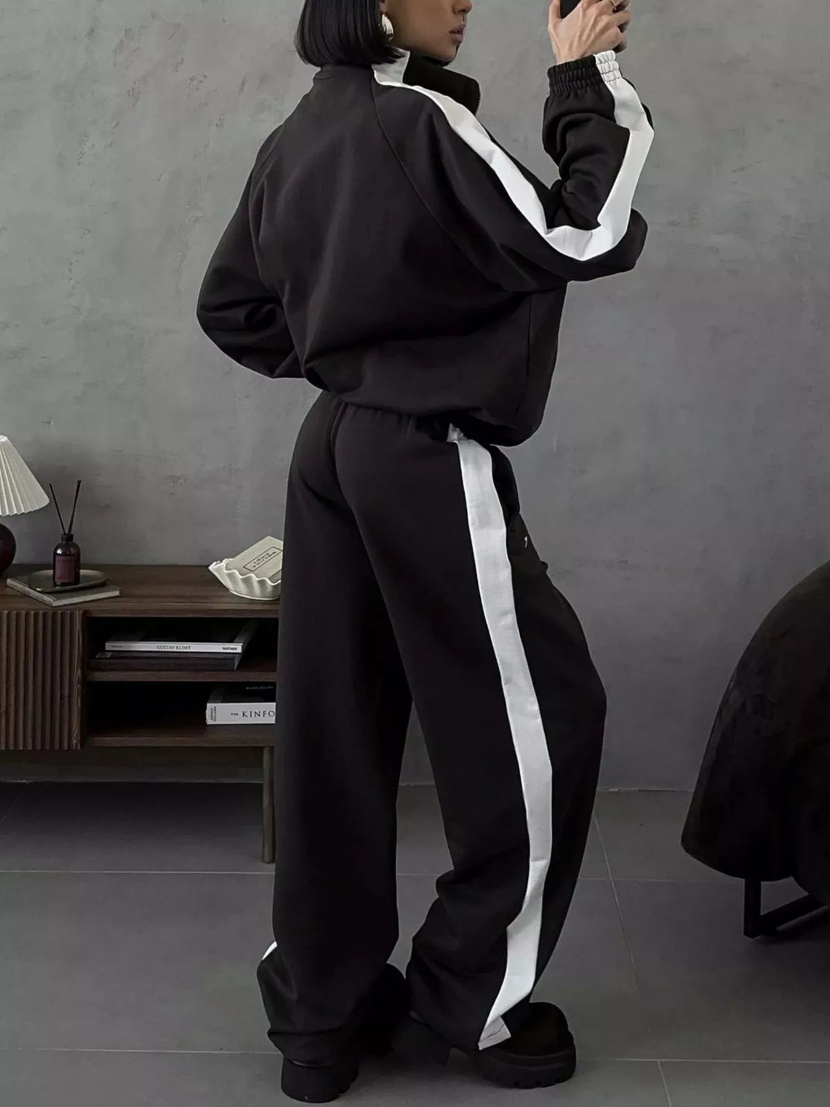 Plush Fashion Hub zip-up long sleeve tracksuit set in soft fabric, featuring a comfortable fit and stylish design.