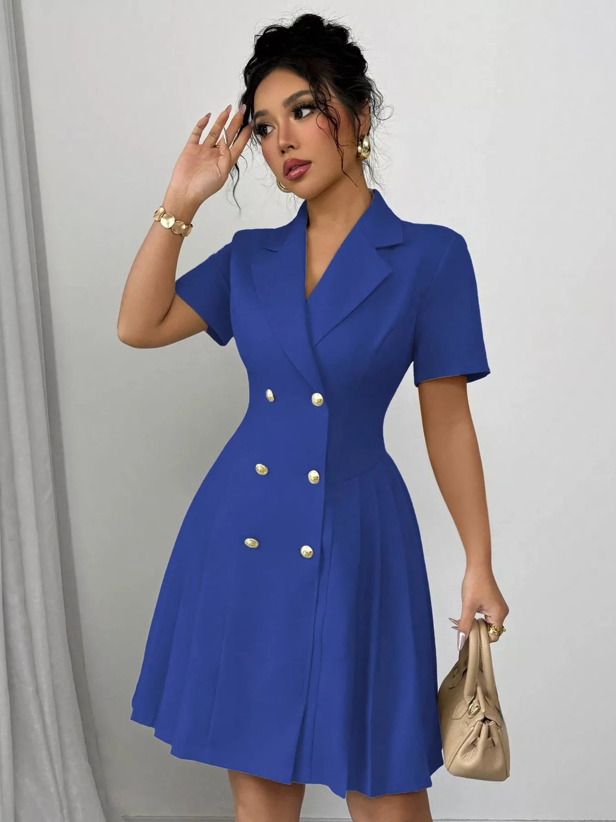 Plush Fashion Hub double-breasted pleated blazer dress featuring structured fit and classic lapels, styled on a mannequin.