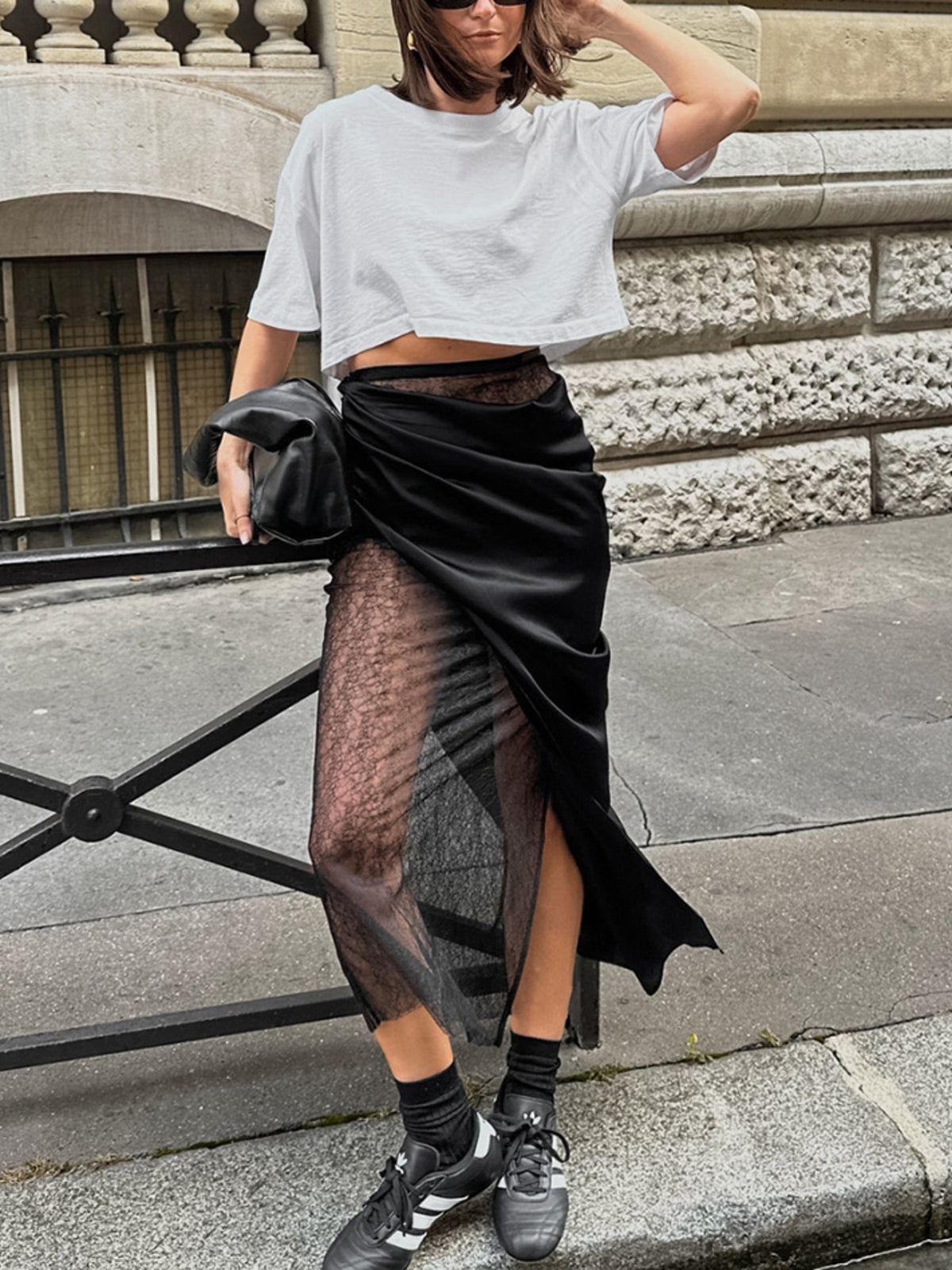 Women’s elegant lace midi skirt with sheer split detail from Plush Fashion Hub, showcasing flowing fabric and intricate lace design.