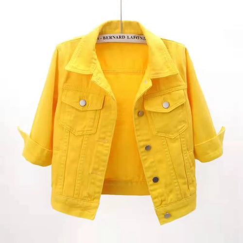 Plus size cropped denim jacket by Trendsi, styled with classic blue denim fabric and silver button details.
