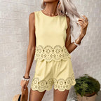 Women's elegant hollow-out floral casualwear set by FitiqueFit, featuring a floral top and matching pants in a stylish 2-piece design.