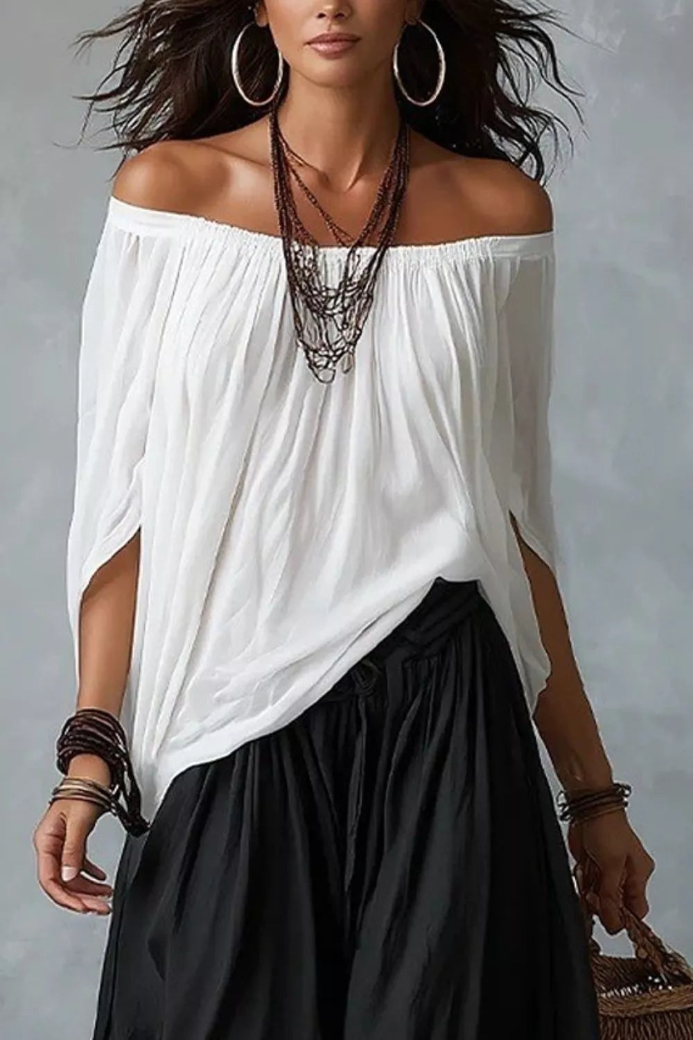 Plus size off-shoulder top with wide-leg pants matching set by Trendsi, featuring a stylish, relaxed fit in a coordinated ensemble.
