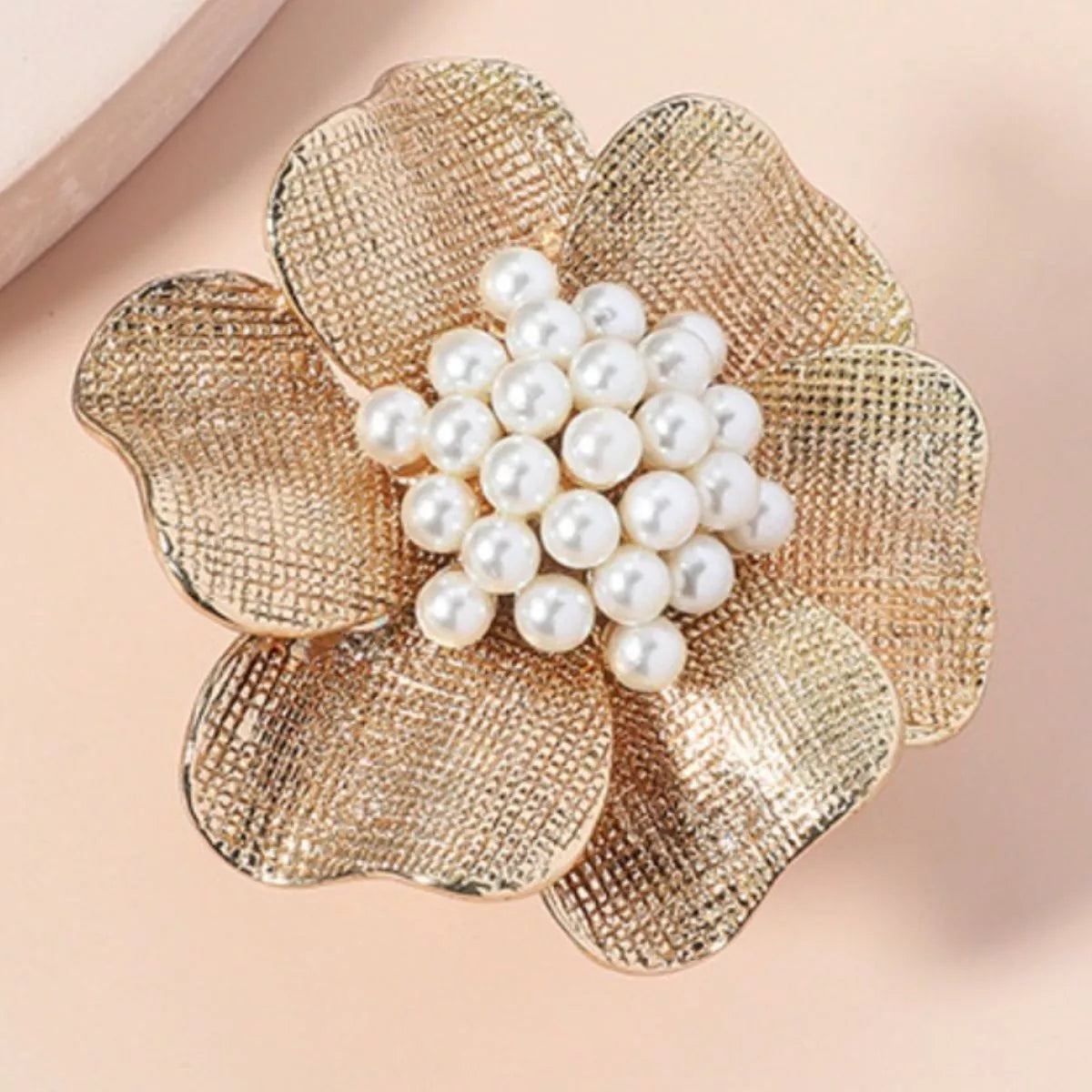 18K gold-plated pearl flower ring from Plush Fashion Hub featuring a delicate floral design and lustrous pearls.