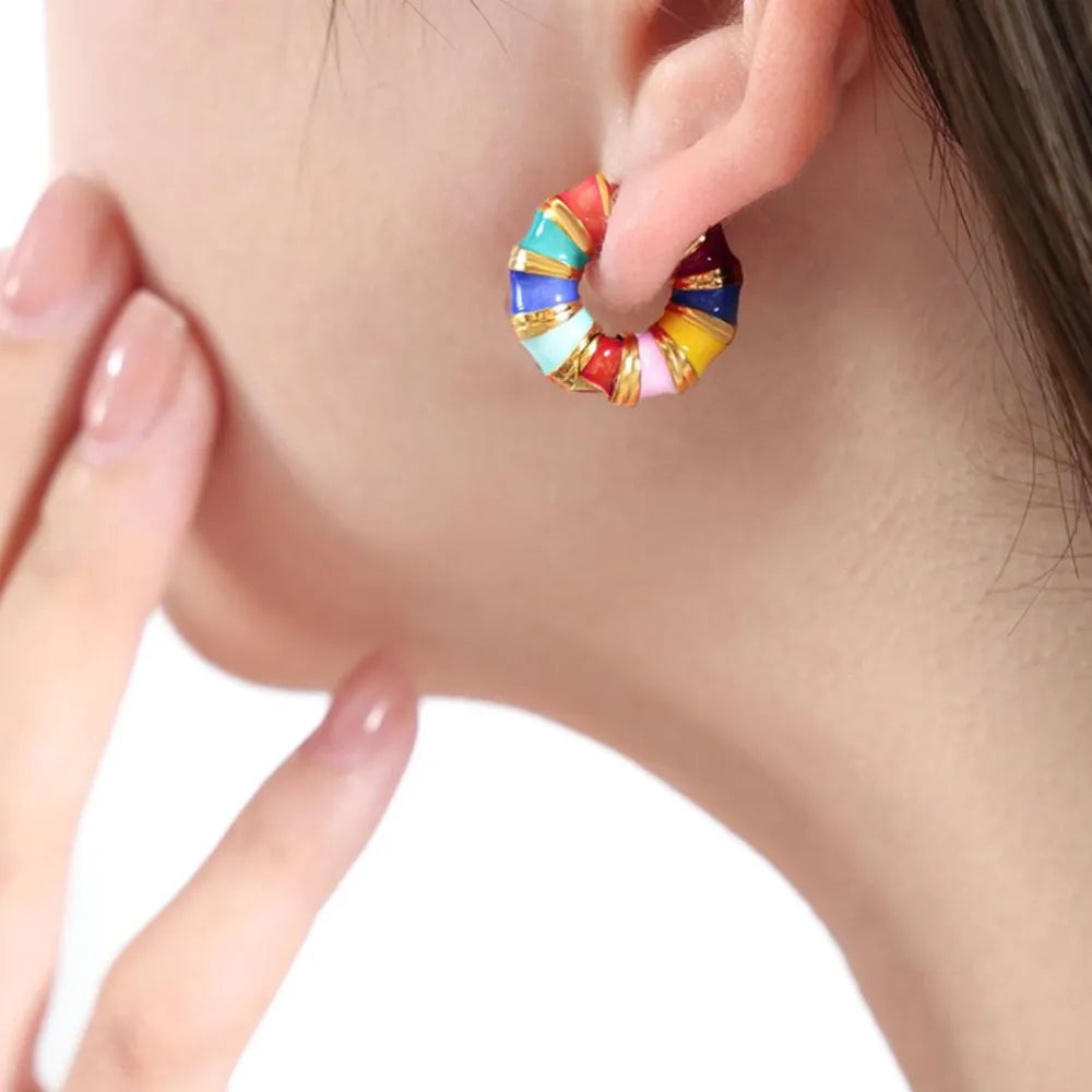 Titanium steel enamel hoop earrings with colorful design, crafted for stylish fashion jewelry, by Plush Fashion Hub.