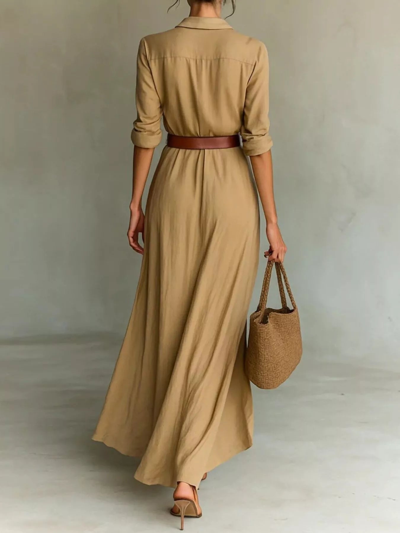 Plus size elegant V-neck ruched maxi dress with belt by Trendsi, featuring a flowing silhouette and stylish design.