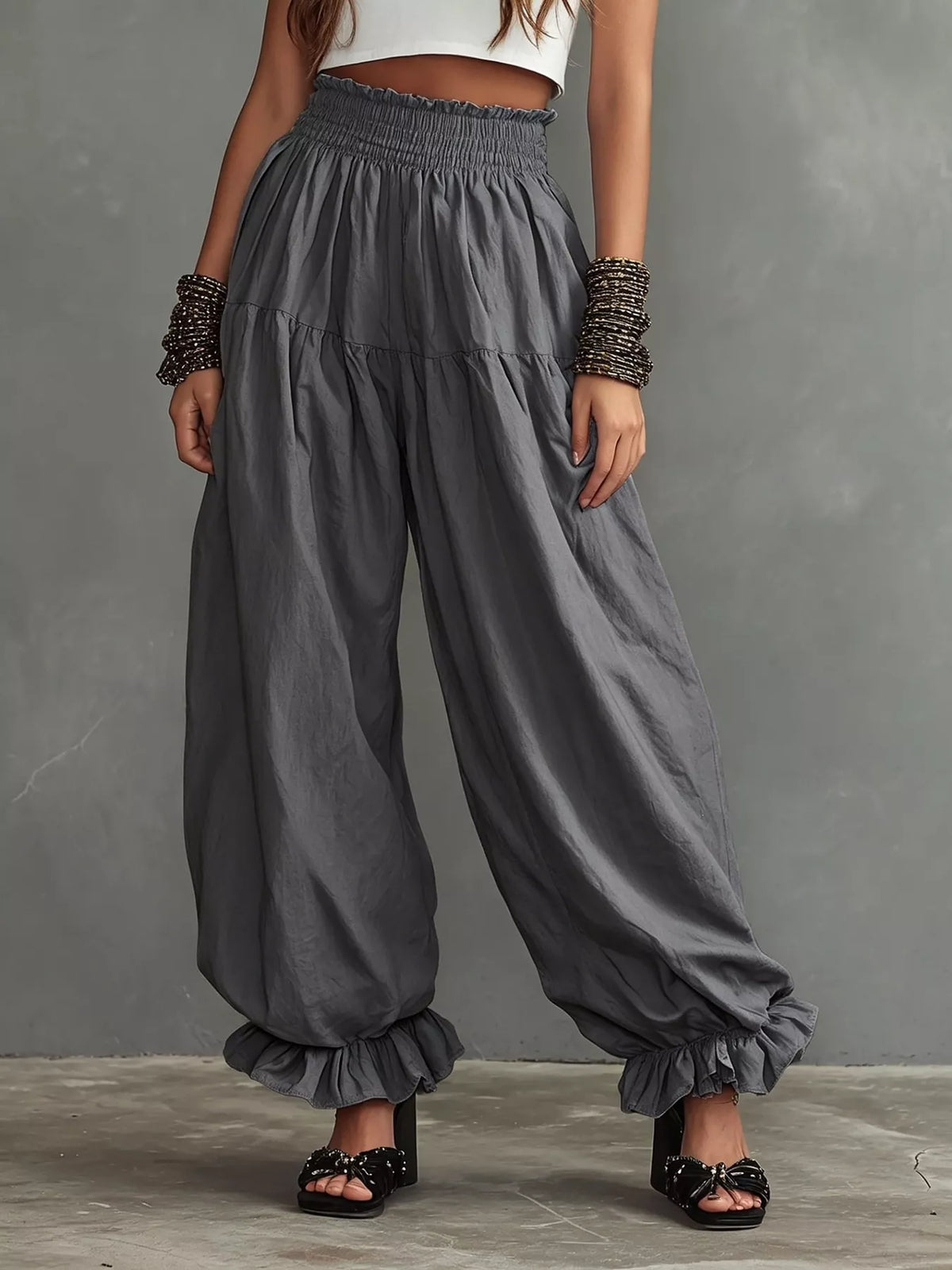 Plus size full smocked ruffle hem wide leg pants by Plush Fashion Hub, featuring flowy fabric and stylish ruffle details.