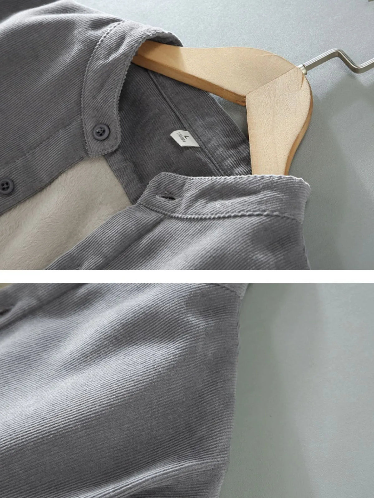 Men's plus size button-up long sleeve jacket from Trendsi, shown in dark fabric with front buttons and collar.