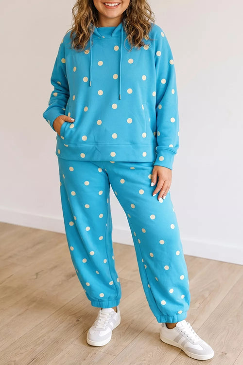 Plus size polka dot hooded drawstring long sleeve top and pants set from Trendsi, featuring a comfortable, stylish matching outfit.