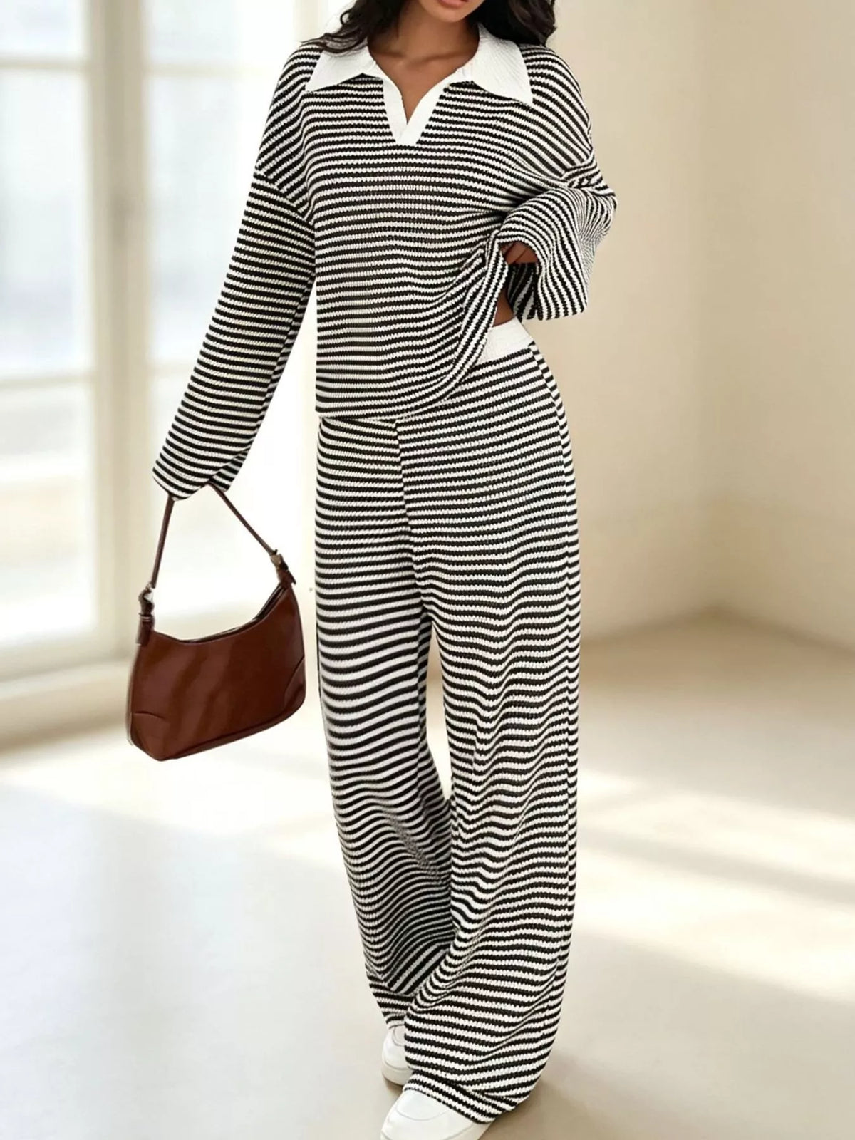 Striped long sleeve polo shirt and wide-leg pants set by Trendsi, featuring a stylish pattern and comfortable fit.