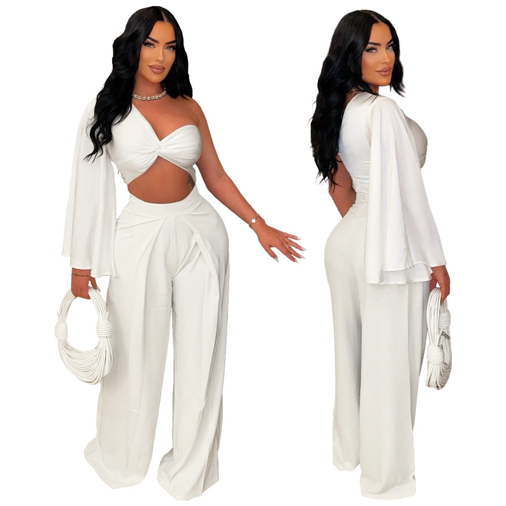 Asymmetrical pleated one-shoulder top with matching trousers from Plush Fashion Hub, stylish and modern women's clothing set.