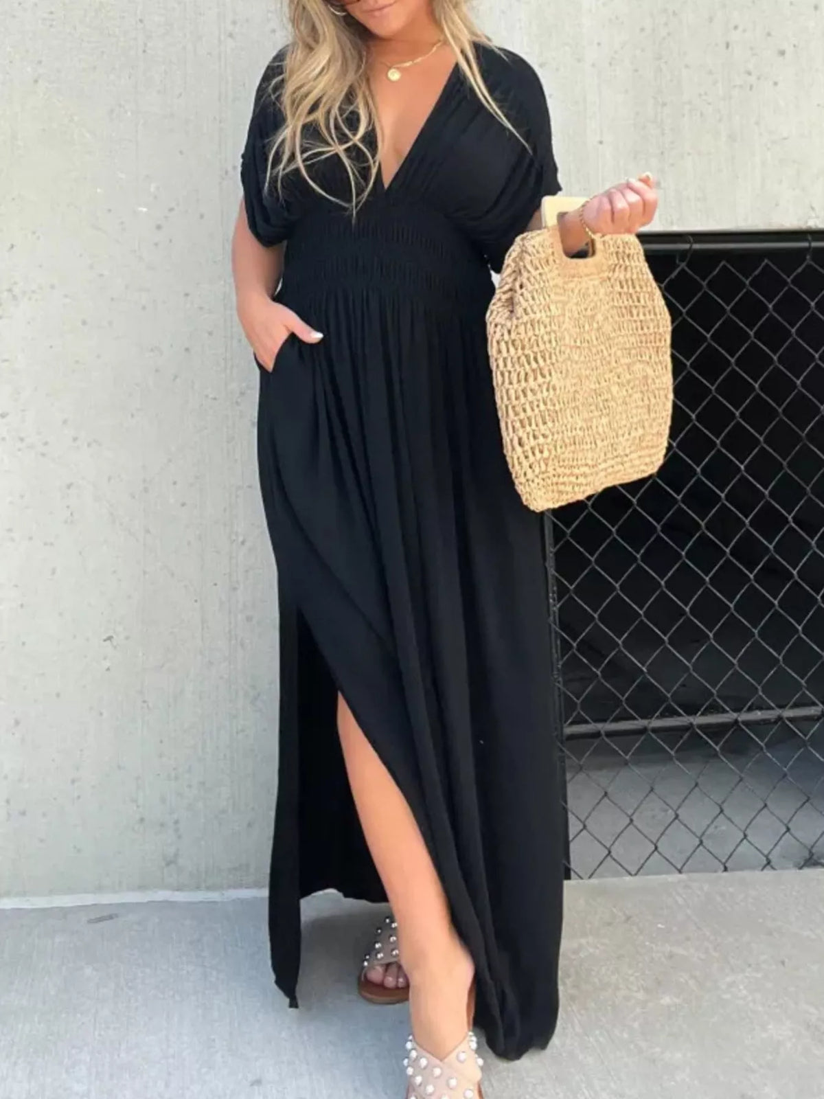 Plus size full slit V-neck smocked waist maxi dress by Plush Fashion Hub, featuring flowy fabric and stylish design.