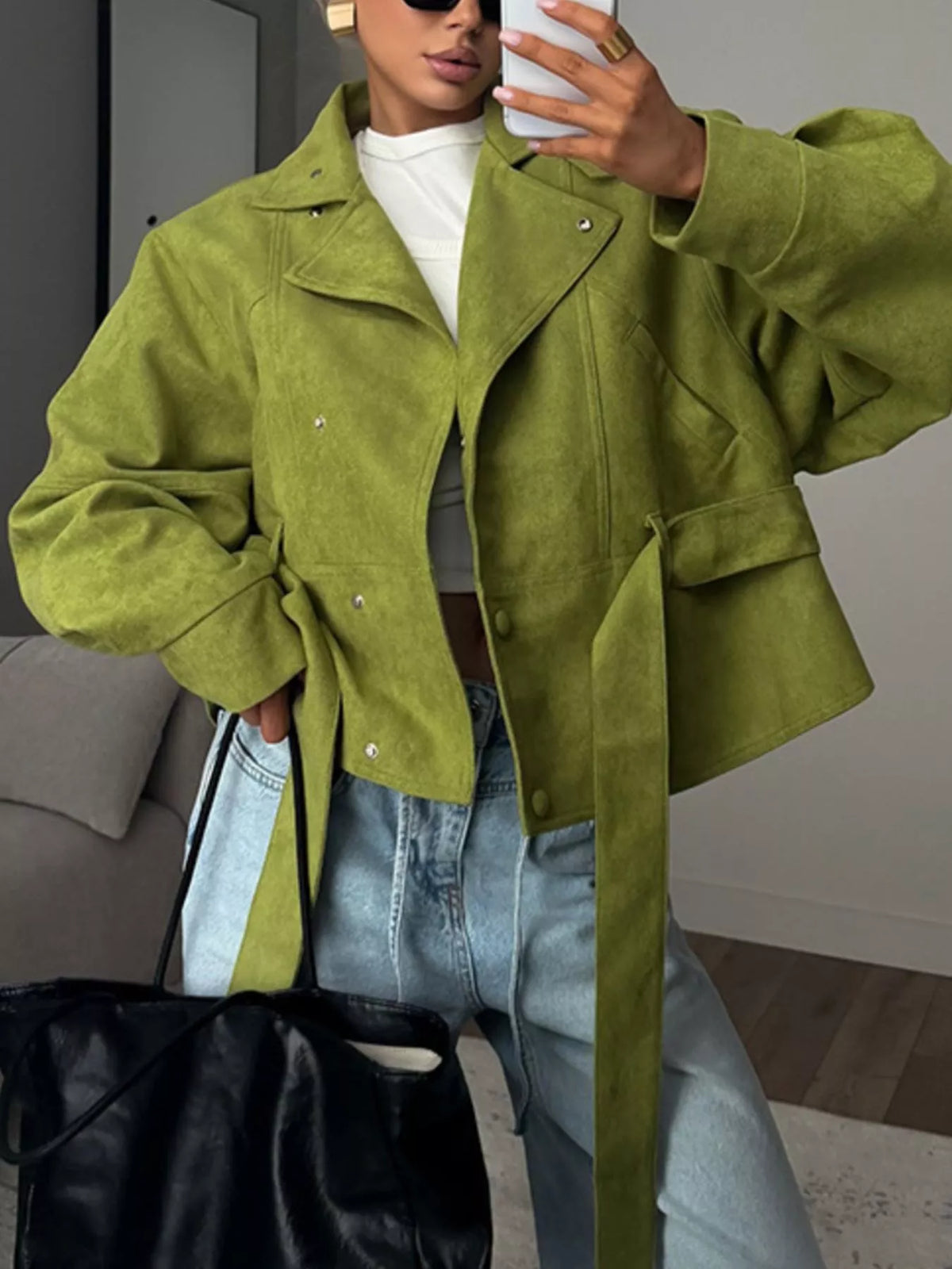 Women's tie waist long sleeve cropped jacket by Trendsi, featuring a stylish fit and button closure, shown on a model.