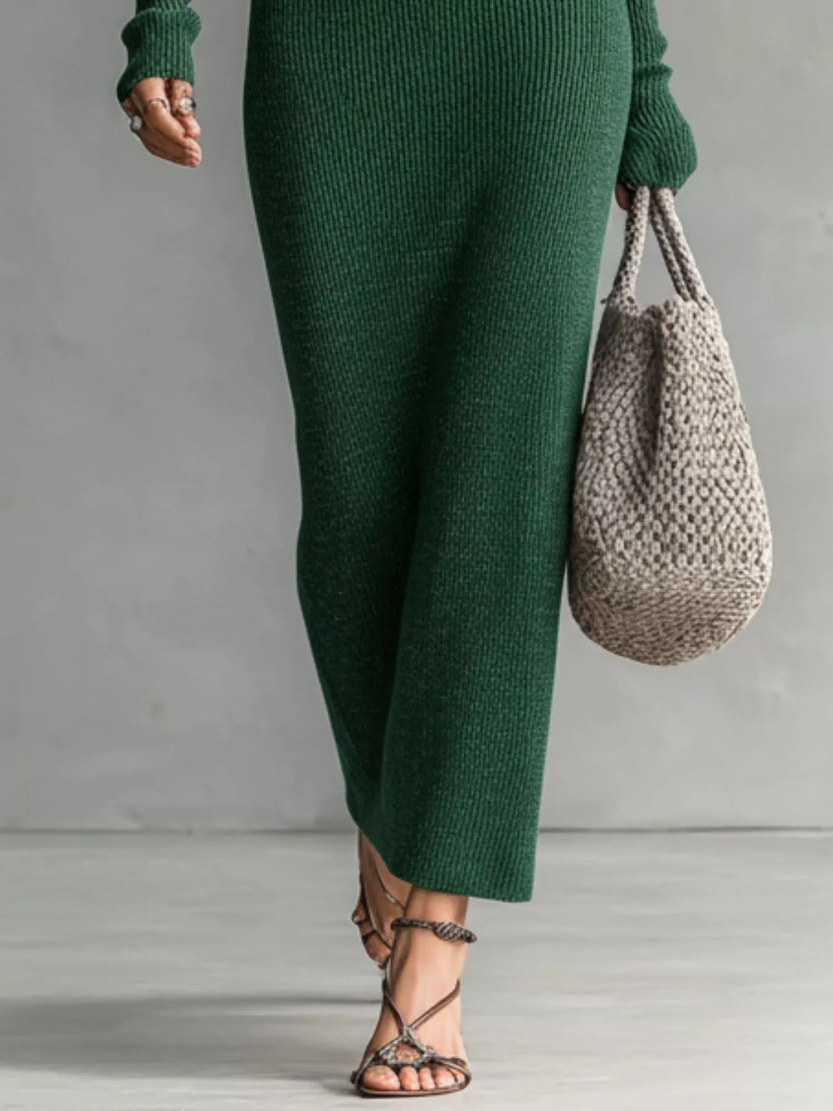 Knit hooded maxi dress with button placket and pockets, trendy and comfortable fashion piece by Trendsi.