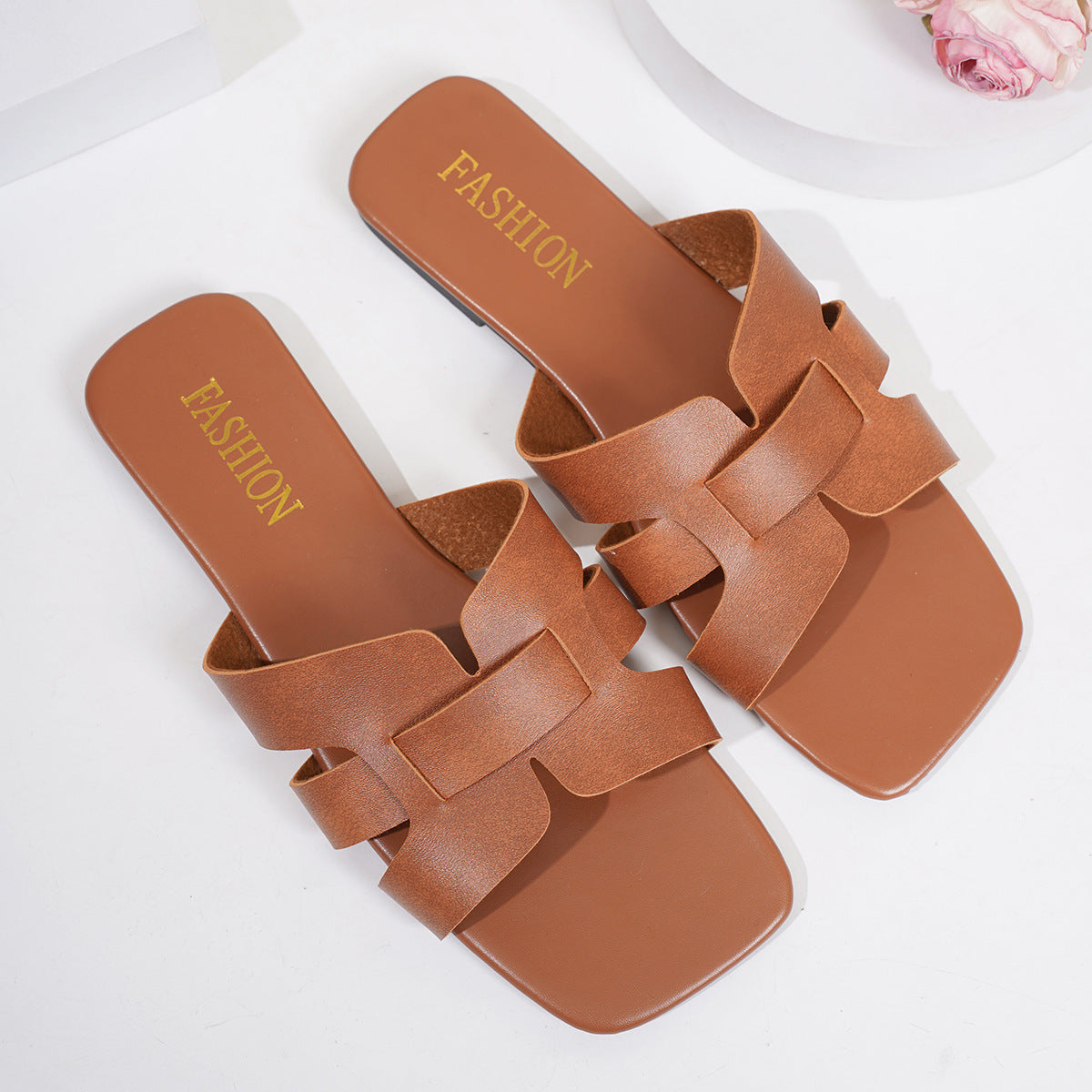 Plush Fashion Hub woven strap slide sandals with flat sole, casual summer footwear, featuring breathable woven design.