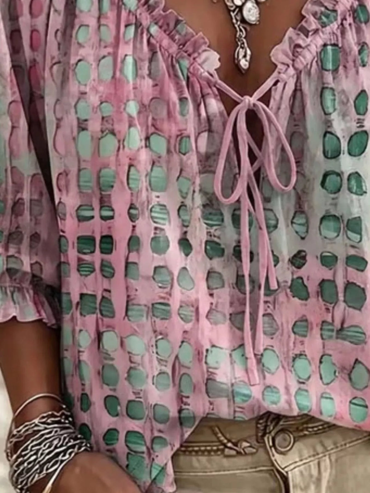 Full size tie-neck blouse with 3/4 sleeves from Trendsi, featuring a stylish design in plus size.