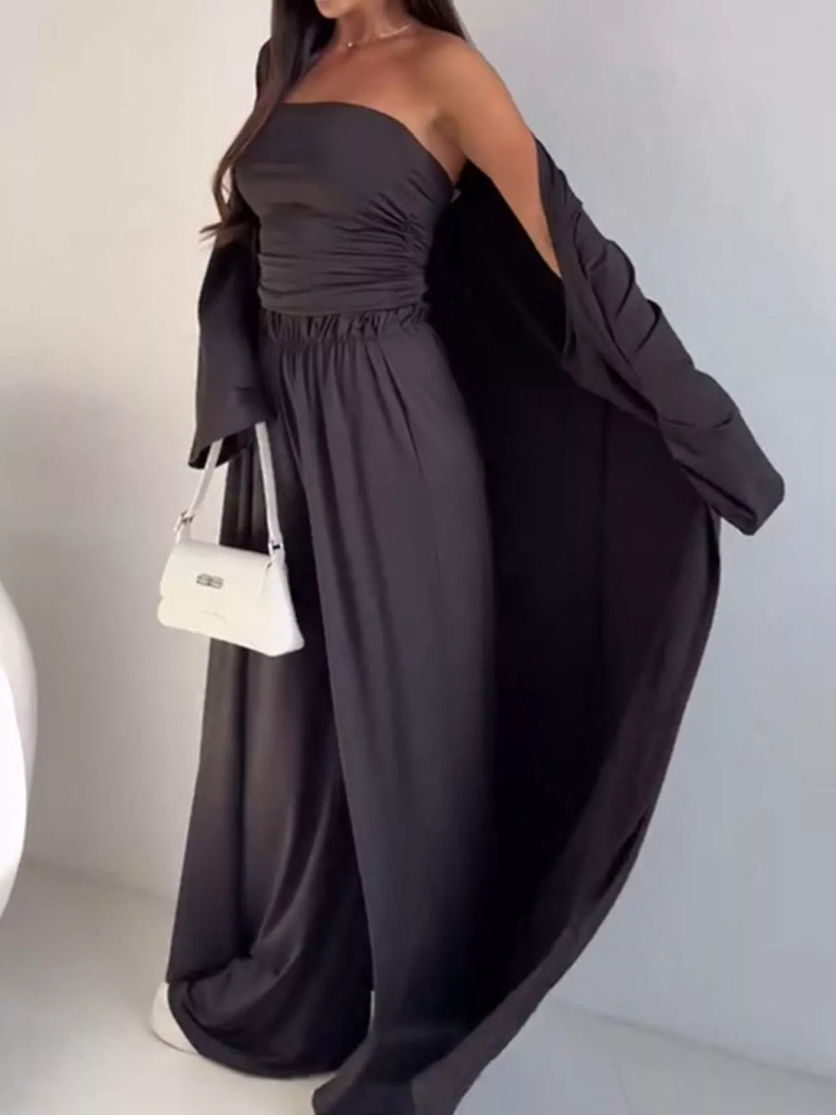 Trendsi chic 3-piece set with strapless ruched crop top, wide-leg pants, and matching cardigan, styled together on a model.