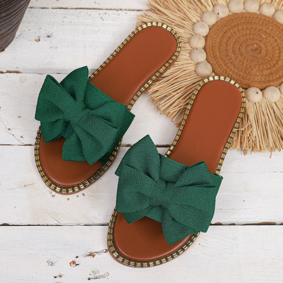 Plush Fashion Hub bowknot embellished flat sandals with stylish design and comfortable flat sole, perfect for casual wear.
