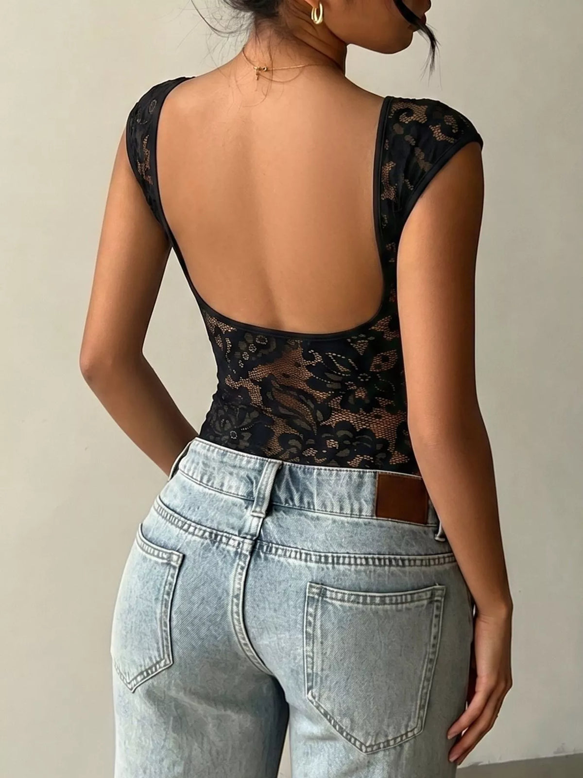 Lace detail cap sleeve T-shirt from Plush Fashion Hub, featuring soft fabric and delicate lace accents on the sleeves.