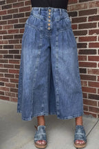High-waisted wide-leg denim jeans by Trendsi featuring button-fly closure and classic cotton denim fabric.