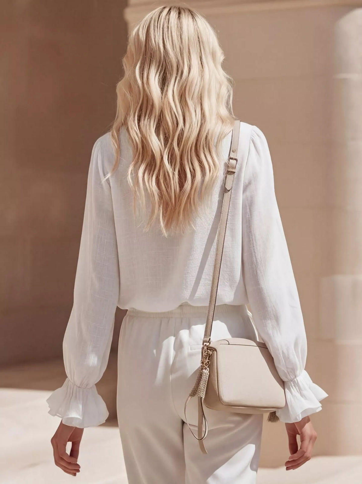 Plush Fashion Hub ruffled V-neck long sleeve blouse with feminine design and elegant detailing, perfect for stylish casual wear.