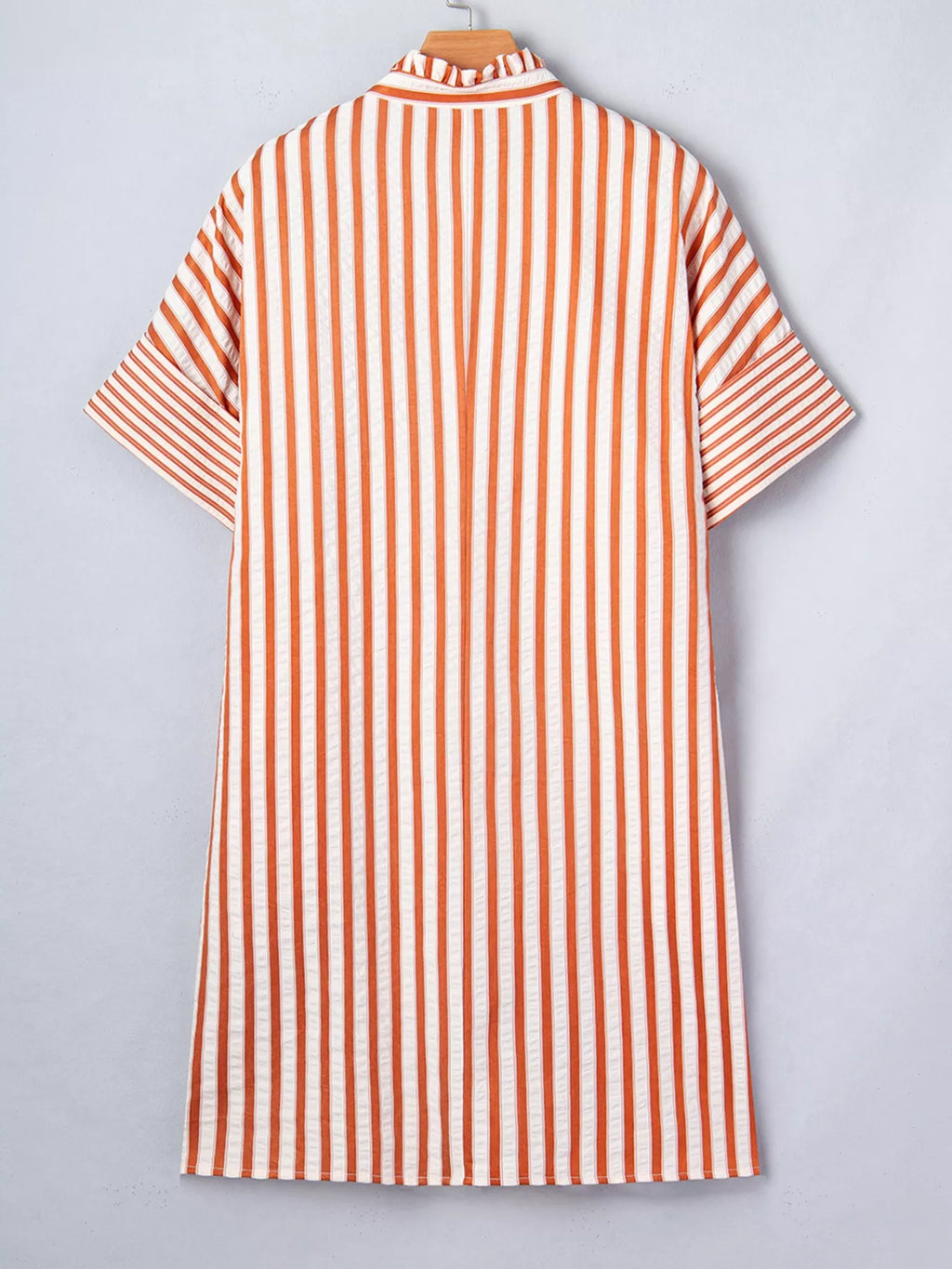 Stripe pinched V-neck mini dress by Trendsi featuring turn-up cuffs and front pockets, displayed on a mannequin.