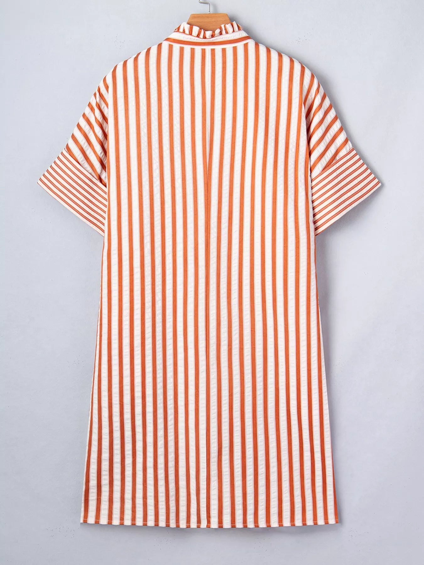 Stripe pinched V-neck mini dress by Trendsi featuring turn-up cuffs and front pockets, displayed on a mannequin.