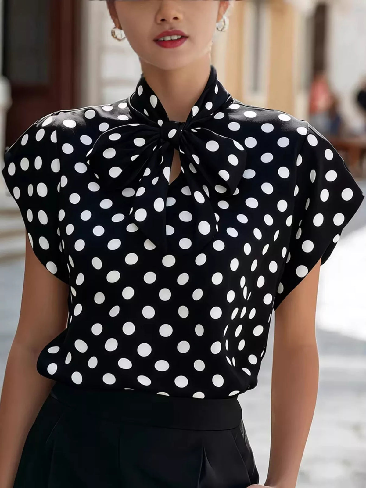 Polka dot tie neck blouse from Plush Fashion Hub, stylish tops with a bow detail and long sleeves, perfect for casual or office wear.