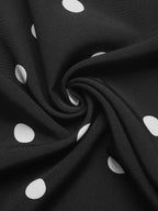 Polka dot strapless wide-leg jumpsuit from Trendsi featuring a flowy, comfortable design and stylish fashion statement.