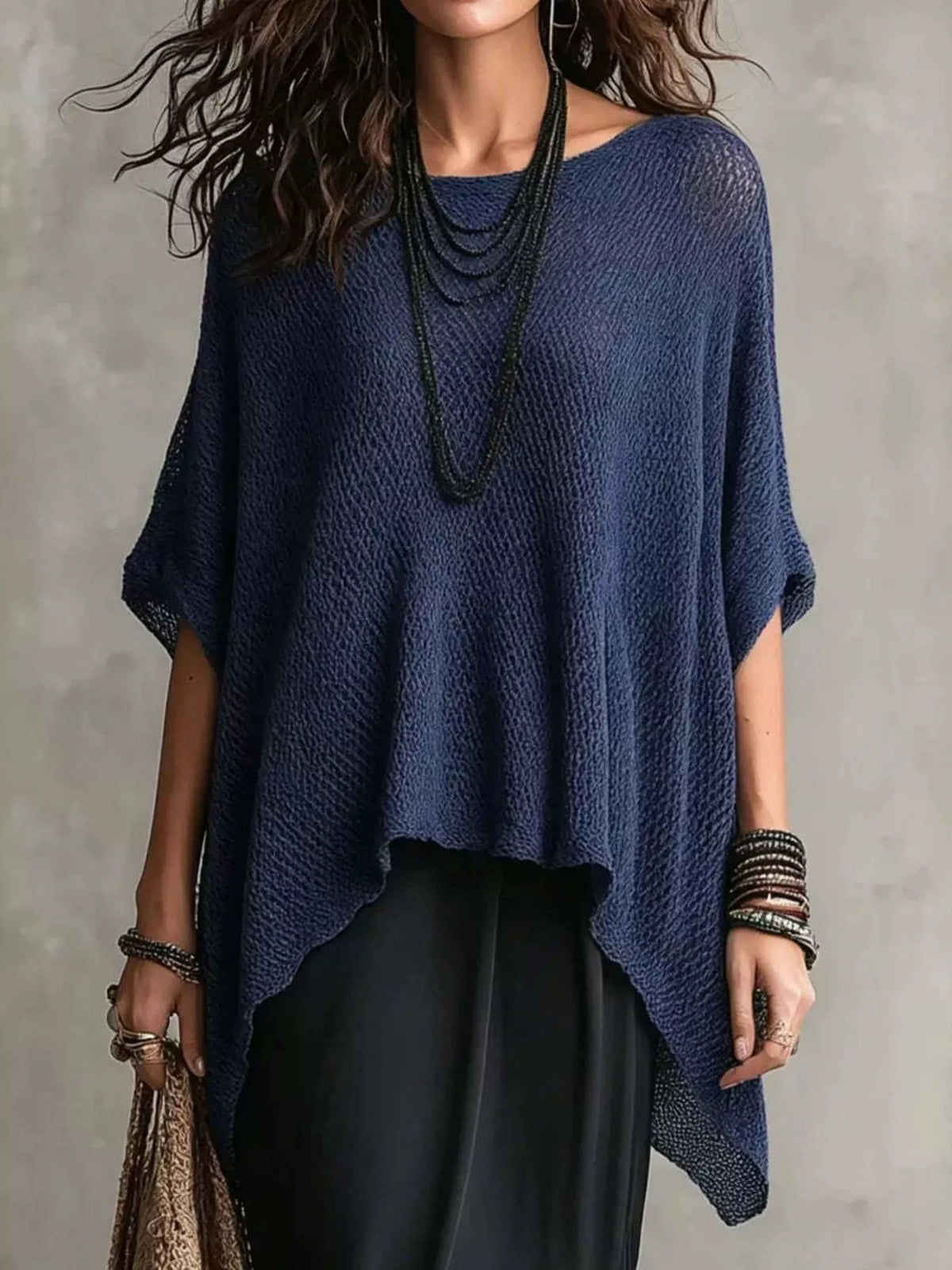 Plus size Plush Fashion Hub knit top with loose fit and round neck, showcased in a full-size, soft and cozy fabric.