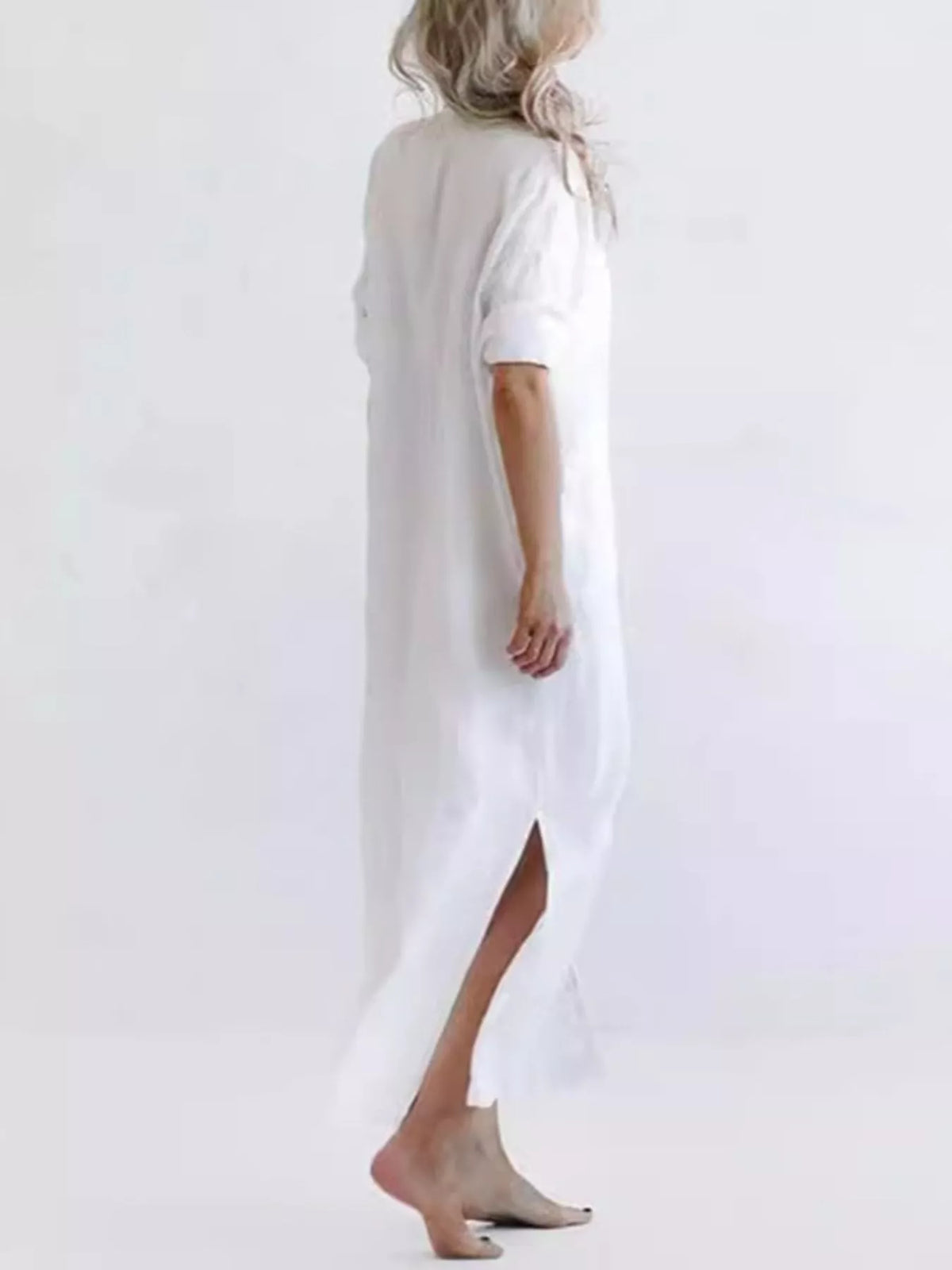 Plus size casual button-down maxi dress by Trendsi, featuring a flowing silhouette and full-length design.