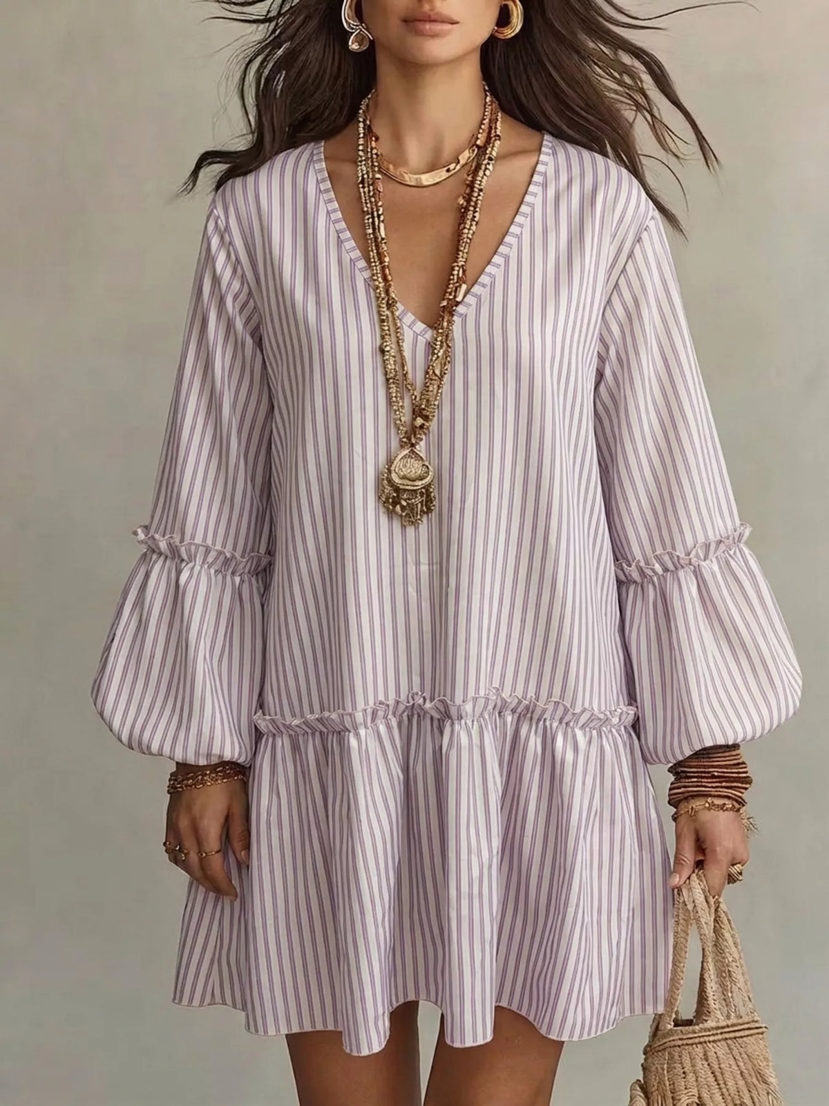 Plus size striped balloon sleeve mini dress by Trendsi, featuring a fitted waist and colorful vertical stripes, casual and stylish.
