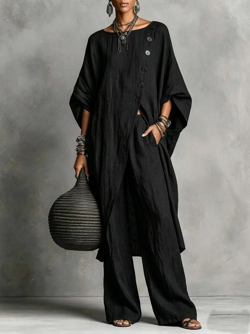 Women's casual FitiqueFit drop shoulder three-quarter sleeve irregular shirt and matching pants set, shown in a relaxed, stylish fit.