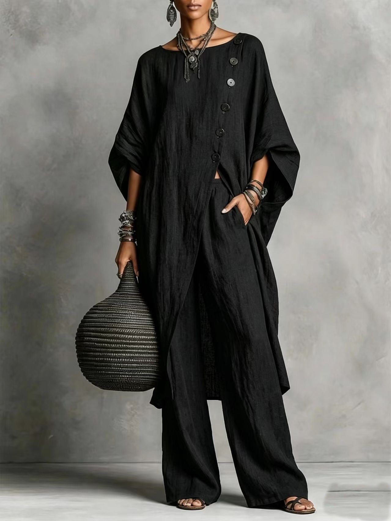 Women's casual FitiqueFit drop shoulder three-quarter sleeve irregular shirt and matching pants set, shown in a relaxed, stylish fit.