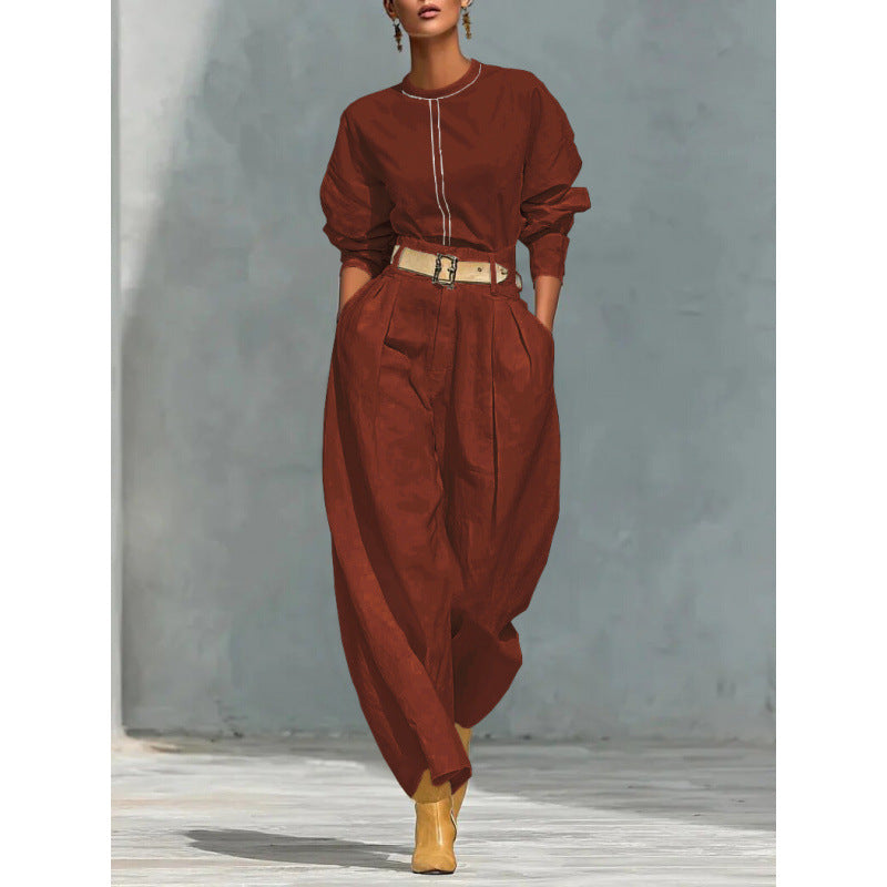 Relaxed two-piece wide-leg set with belt from Plush Fashion Hub, featuring a stylish top and matching comfortable trousers.