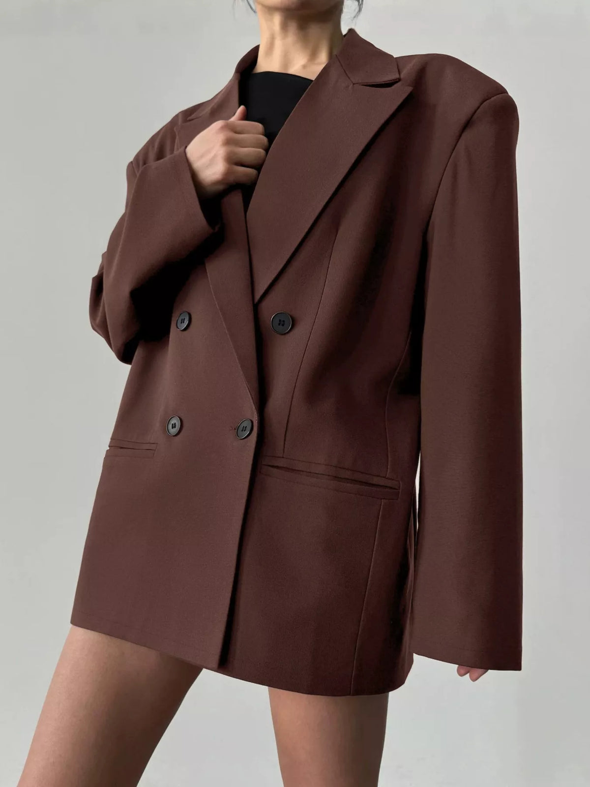 Double-breasted blazer with lapel collar from Trendsi, featuring a tailored fit and classic design in a neutral color.