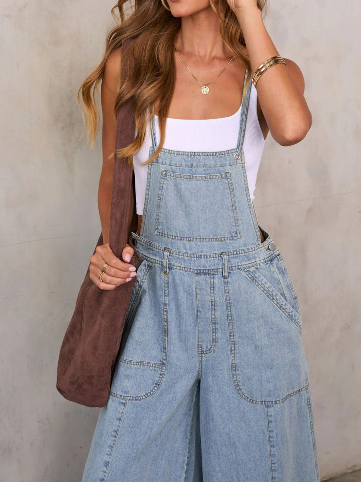Women's relaxed fit wide leg denim overalls jumpsuit by Plush Fashion Hub, featuring cotton blend fabric and adjustable shoulder straps.