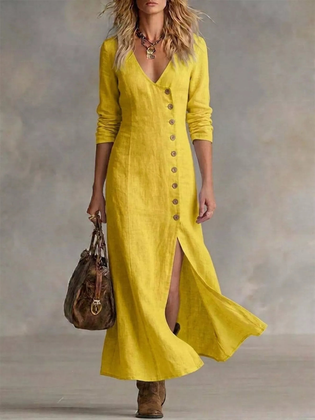 Plus size full length maxi dress with button front and slit, made by Plush Fashion Hub, shown in a flowing fabric design.