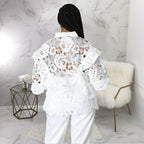 Women’s Bella Mia lace-up cardigan with lantern sleeves, hollow out cutouts, flounce trim, and stylish outerwear design.