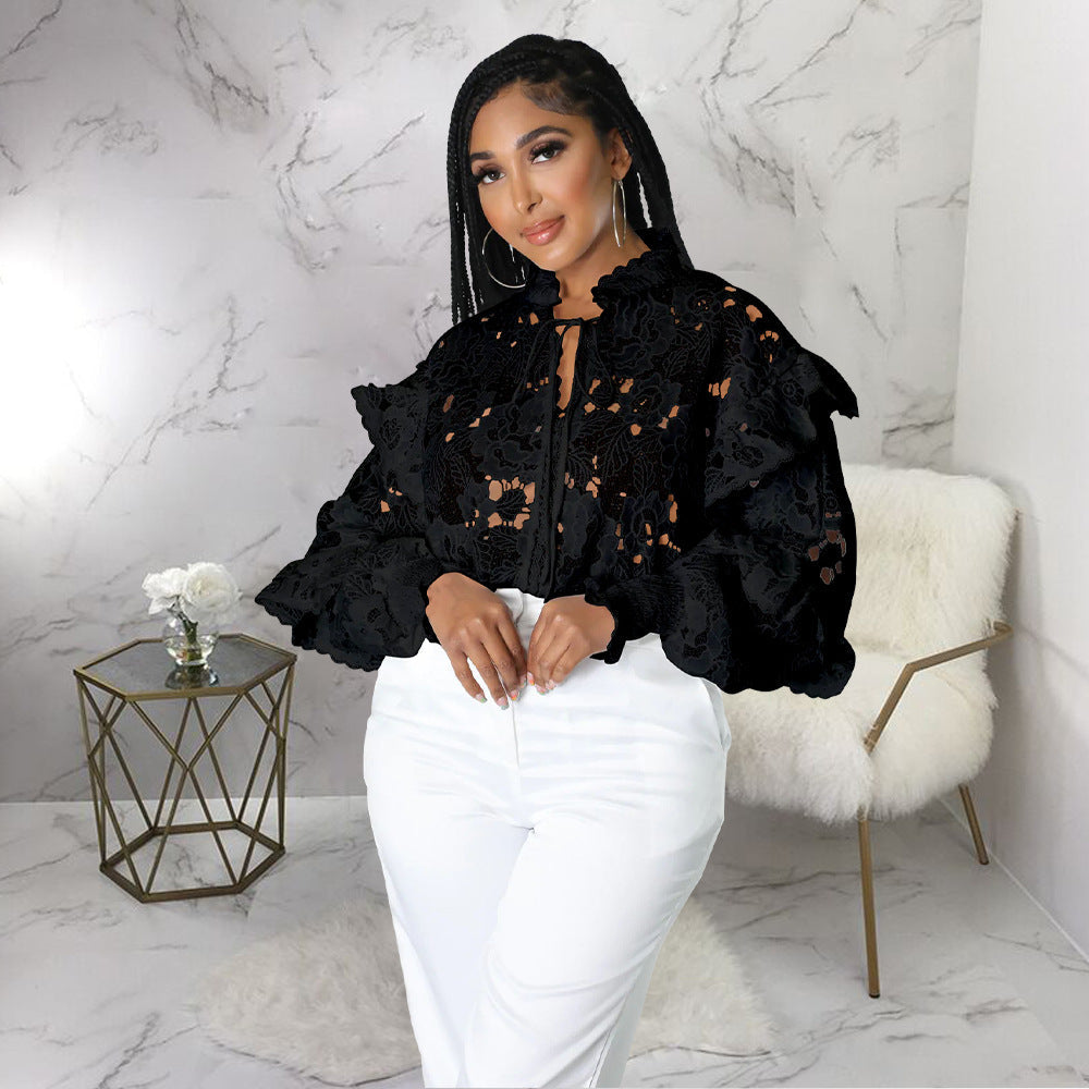 Women’s Bella Mia lace-up cardigan with lantern sleeves, hollow out cutouts, flounce trim, and stylish outerwear design.