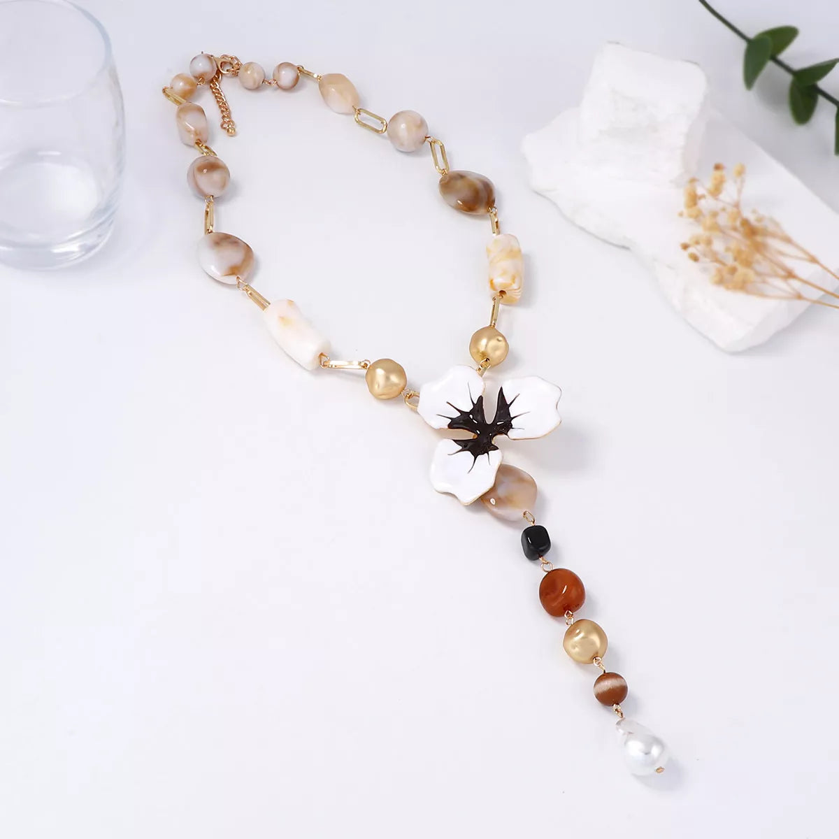 Y-shaped alloy dripping oil flower resin necklace with intricate design, featuring vibrant resin and metal details, from Plush Fashion Hub.