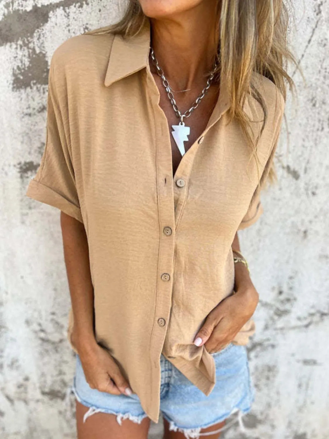 Women's collared button-down blouse from Plush Fashion Hub, featuring half sleeves, perfect for office or casual wear.