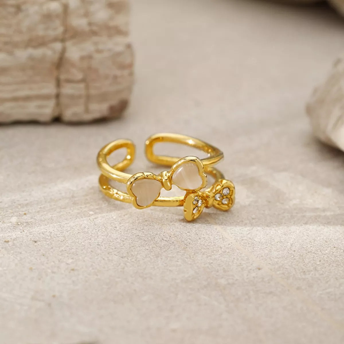 Gold-plated bow open ring from Plush Fashion Hub, featuring a sleek design with smooth finish and elegant open band.