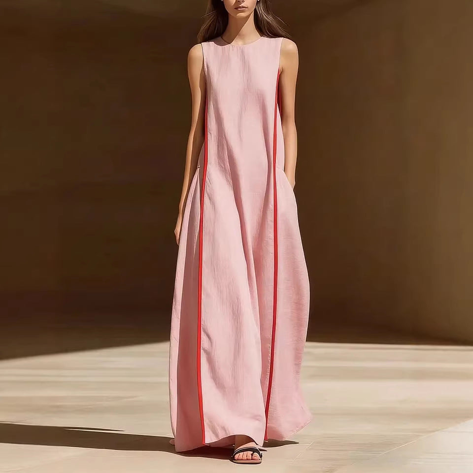Women's linen sleeveless loose striped maxi dress by FitiqueFit, ideal for casual summer wear, shown hanging on a wooden hanger.