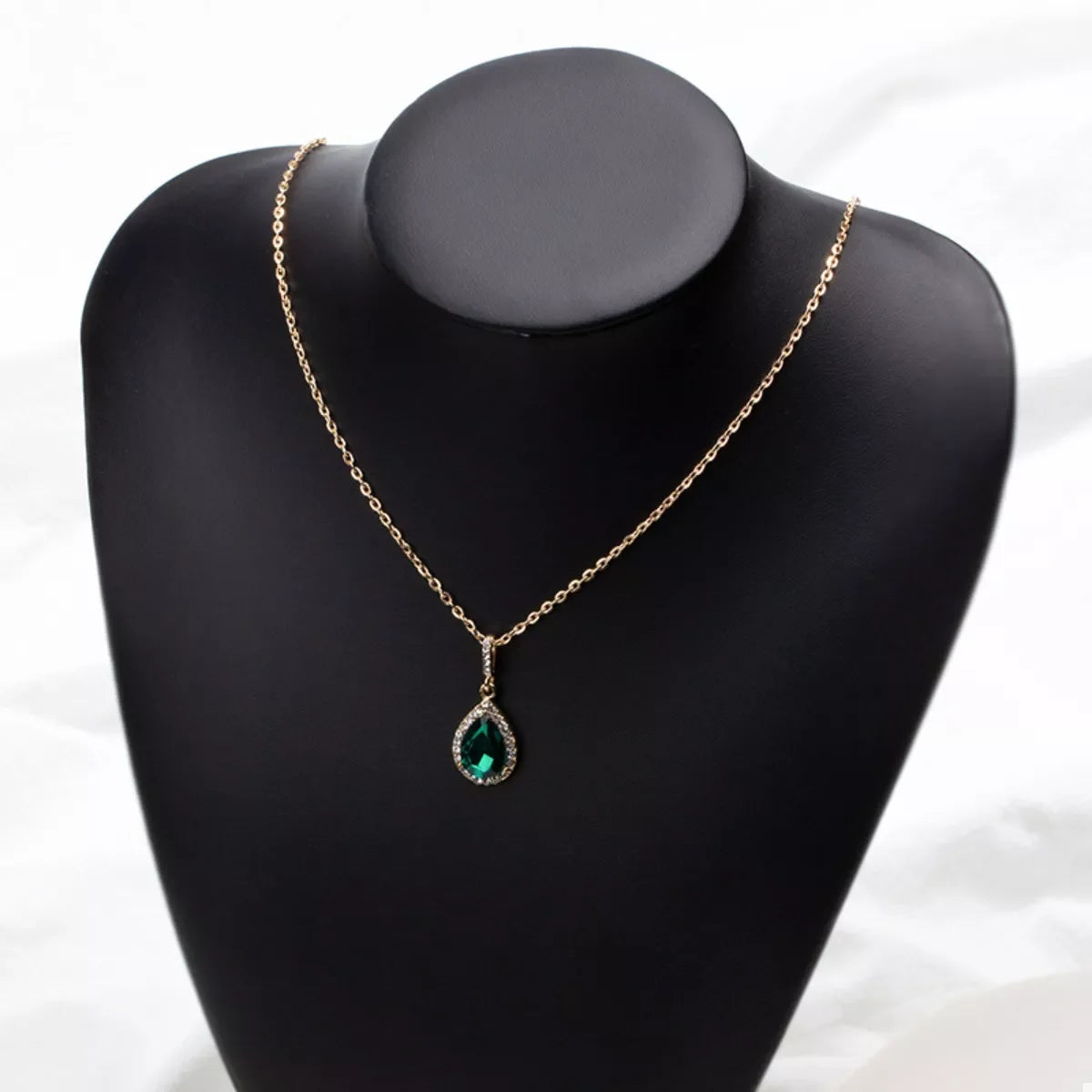 18K gold-plated teardrop pendant necklace with a delicate design, showcasing a stylish accessory from Plush Fashion Hub.